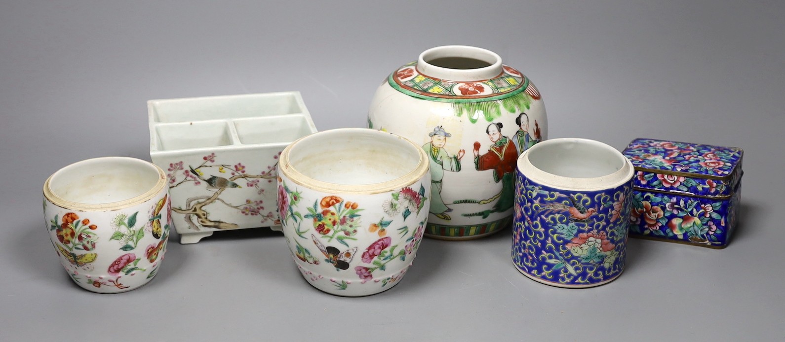 A Chinese famille verte ginger jar, together with three famille rose ceramics, a blue enamel box and cover, and a Chinese blue polychrome box (6)